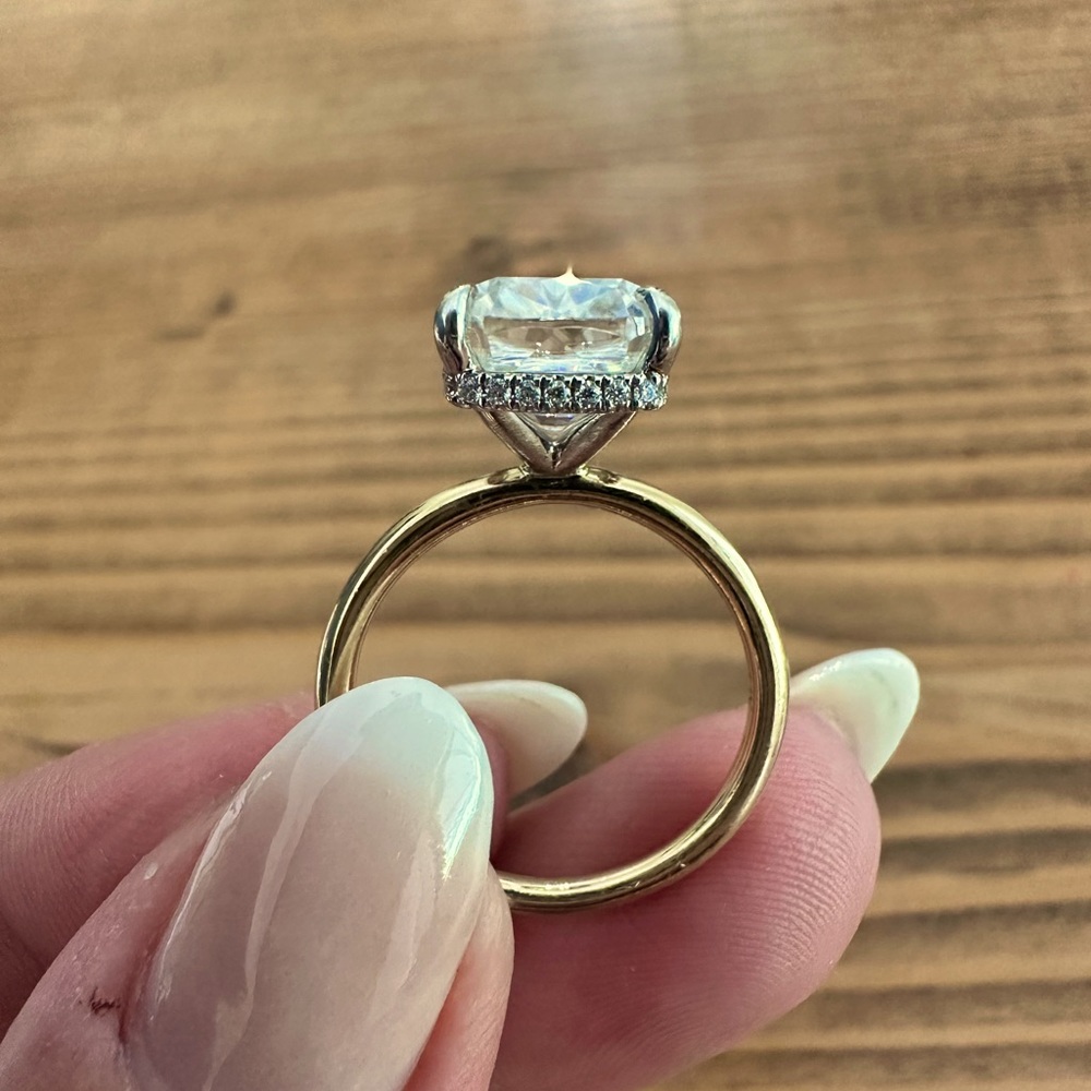 Two tone 14k gold hidden halo Moissanite ring w/ 14k gold band. SET